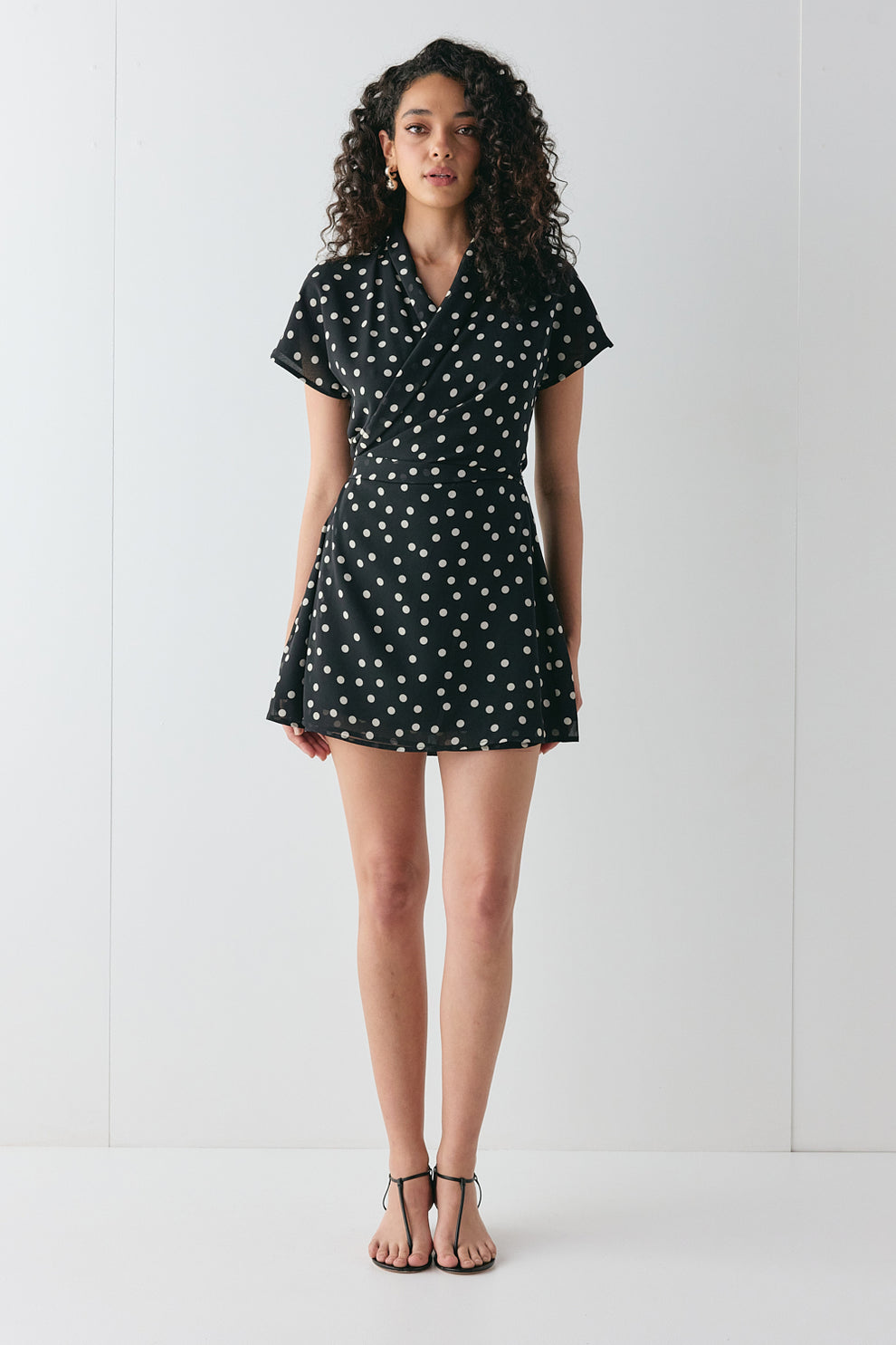 navya wrap mini dress in basic polka black Voyage Mini Dress Black Polka Dot